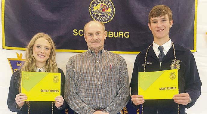 Young Farmers Scholarship – (from left) Shelby Nichols, recipient; Mark Vecera Young Farmers president; and Grant Kubala, recipient.