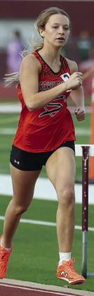 Michaela Kollmann runs to a first-place finish in the 800-meter event. Photo By Melanie Berger / Courtesy of Flatonia Argus