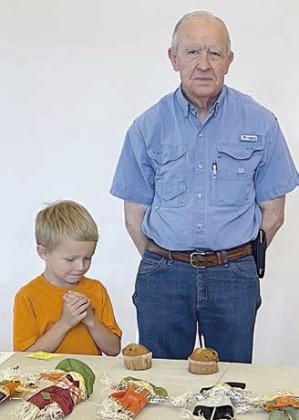 Celebrating October birthdays were (from left) Dominik Woodworth and Alfred Ermis.