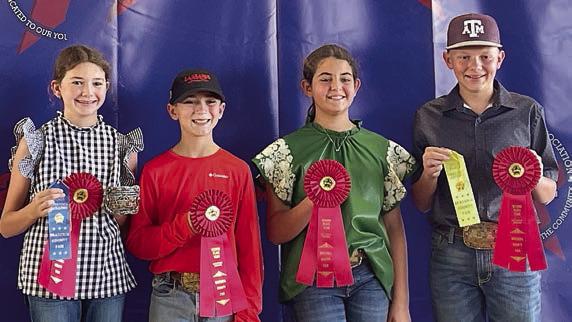 Reserve Champion Intermediate Team – (from left) Laramie Laake, Crockett Guenther, Adalyn Carrales and Holden Holub. Crockett Guenther and Holden Holub are members of the Schulenburg 4-H.