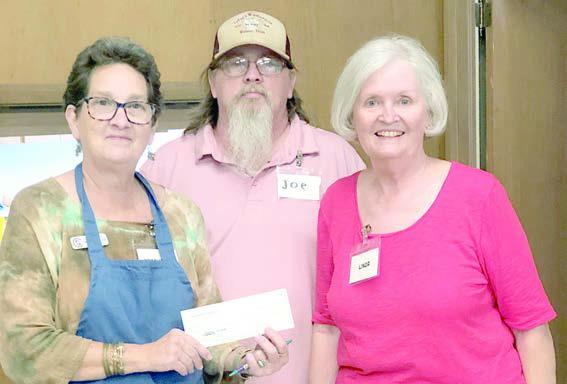 A donation was made to Senior Connections, represented by Stephanie Shroyer, (left) program director, by Weimar United Church, represented by Joe Wallace (center) and Linda Vornsand (right).