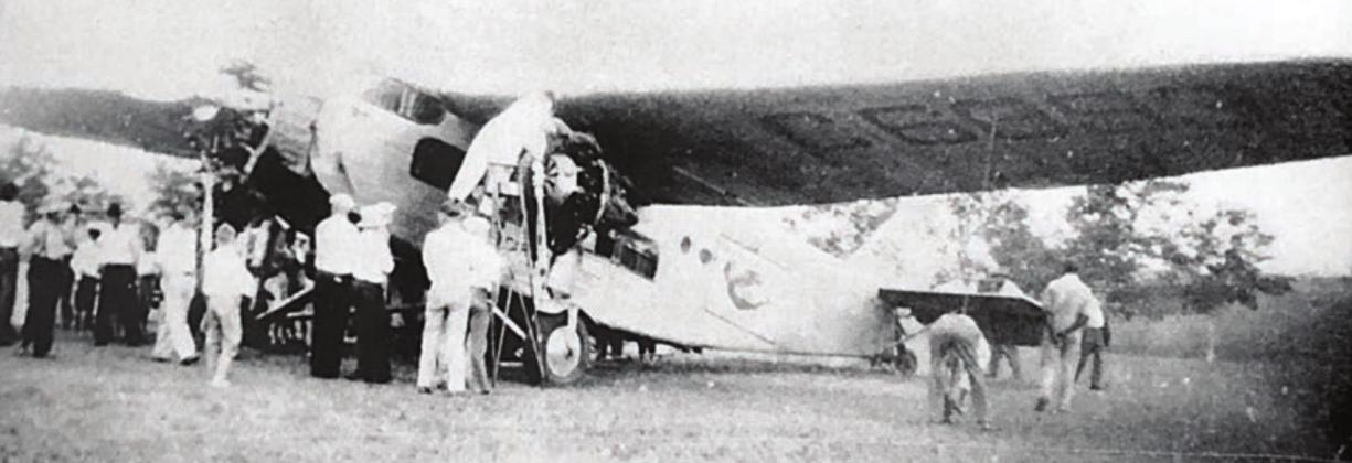 Ford Trimotor Fokker monoplane called The Evening Star transported a celebrated guest, a yearling Holstein bull, to the Schulenburg area.