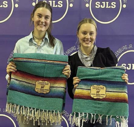 Steer – grand champion Madyson Holub (left) and reserve champion Keeley Warnken (right).