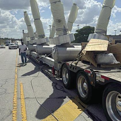 Oversized load knocks down lines Sunday