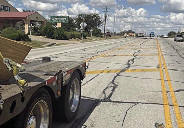Oversized load knocks down lines Sunday