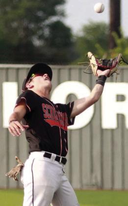 Cooper Demel gets to a popup in shallow right field in game three. Sticker Photo By Darrell Vyvjala