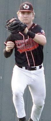 Left fielder Brycen Schramek gloves a line drive in game three. Sticker Photo By Darrell Vyvjala