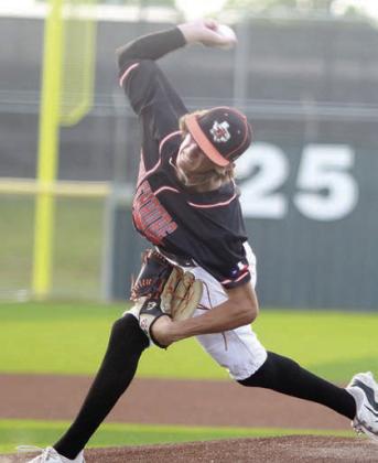 Connor Lichnovsky delivers a pitch in game three. Sticker Photo By Darrell Vyvjala