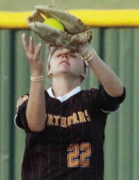 Miranda Bonner secures a fly ball in centerfield. Sticker Photo By Darrell Vyvjala Sticker Photo By Darrell Vyvjala