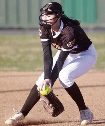 Second baseman Ava Faith fields a Lady Bulldogs grounder. Sticker Photo By Darrell Vyvjala