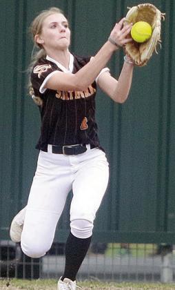 Right fielder Mallory Bonner runs in to snag a line drive against Ganado. Sticker Photo By Darrell Vyvjala