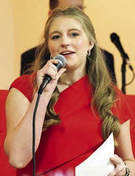 Reagan Moreau speaks on behalf of her father, Craig, at the forum. Photos By Melanie Berger / Courtesy of Flatonia Argus