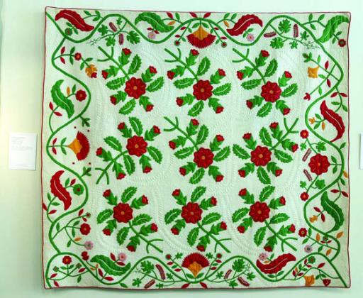 1860 Foral Applique Quilt is one of the quilts that’s over 100 years old displayed at the Texas Quilt Museum.
