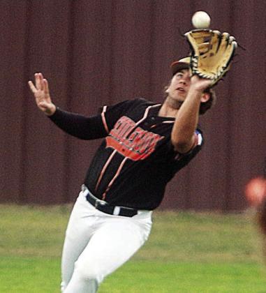 Landon Conner makes a running catch in shallow right field during the Shorthorns’ 16-0 victory over Shiner St. Paul in the Flatonia tournament on Friday morning. Sticker Photo By Darrell Vyvjala
