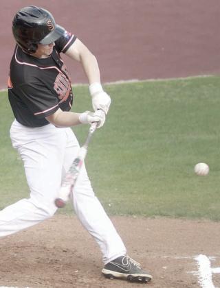 Owen Brenek connects for an RBI-double in the top of the first inning Friday morning. Sticker Photo By Darrell Vyvjala