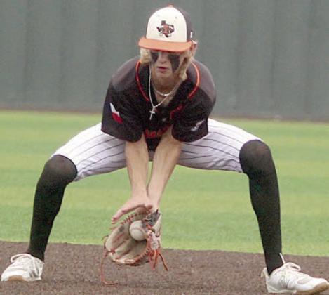 Shortstop Connor Lichnovsky fields a grounder for an out in the bottom of the seventh Saturday. Sticker Photo By Darrell Vyvjala