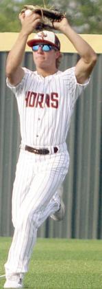 Centerfielder Bryce Stoever runs in to catch a shallow fly ball in game one. Sticker Photo By Darrell Vyvjala