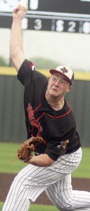 Connor Fogle delivers a strikeout pitch in the first inning Saturday. Sticker Photo By Darrell Vyvjala