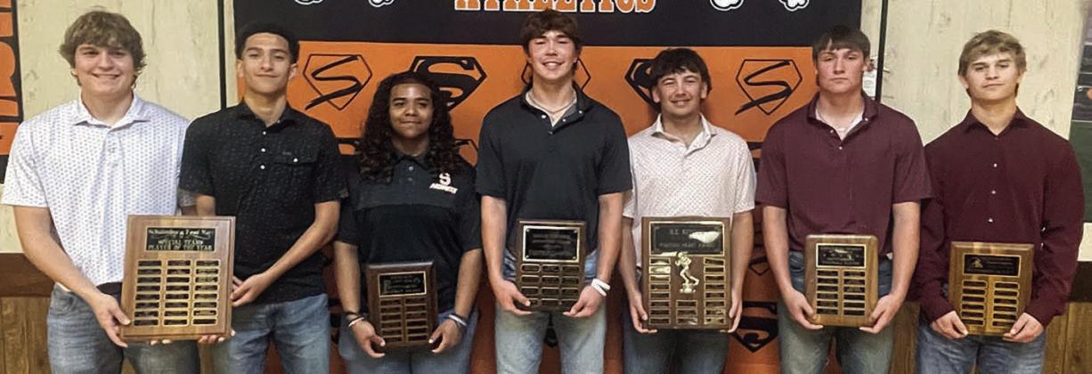 FOOTBALL – (from left) Mason Kunschick and Denver Carr, Schulenburg Food Mart Special Teams Award; Keigan Johnson, Outstanding Lineman Award; Jayse Janda, Shorthorn Booster Club Most Valuable Player Award; Landon Conner, Henry Keuper Fighting Heart Award; Owen Brenek, Chamber of Commerce Outstanding Player Award; and Emerson Harvey, Defensive co-MVP. Not shown: Jayvan Luhrs, Defensive co-MVP; and Da’Terrion Houston, A. C. Winkelman Outstanding Back Award. Sticker Photo By Darrell Vyvjala