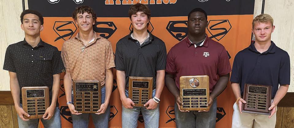 BOYS’ BASKETBALL – (from left) Denver Carr, Iron Pants Award; Van Prihoda, Most Improved Award; Jayse Janda, Player of the Year Award; Tavondrick Ellison, Defensive MVP; and Caden Herzik, Offensive MVP. Sticker Photo By Darrell Vyvjala
