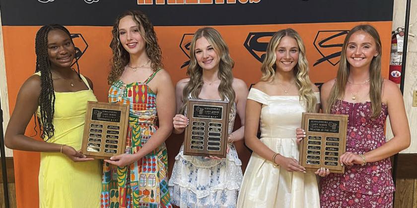 GIRLS’ BASKETBALL – (from left) Jashiya Jackson and Grace Schramek, Defensive MVPs; Alana Herzik, Offensive MVP; Jenna Guentert and Miranda Bonner, Player of the Year Award. Sticker Photo By Darrell Vyvjala