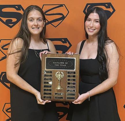 MANAGERS OF THE YEAR – (from left) Agnes Tofel and Gracie Burton. Sticker Photo By Darrell Vyvjala