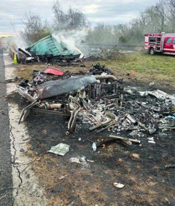 Top photo: The bridge guardrail that was damaged. Bottom photo: The semi-tractor that burned up with the smoldering trailer in the background. Photos Courtesy of SVFD