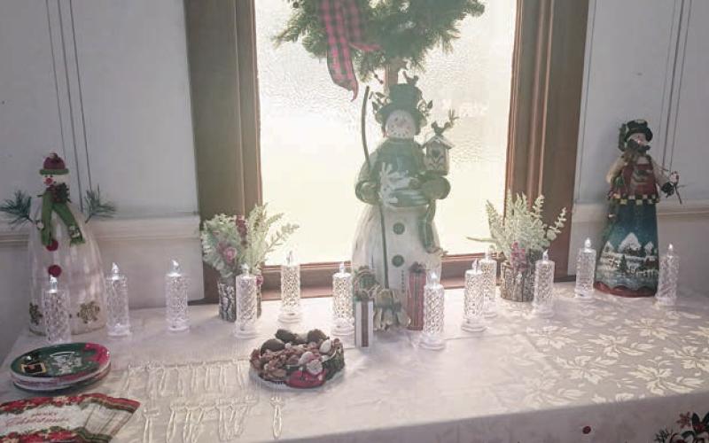 The Dessert Table, awaiting goodies from the hostesses, also had festive decorations.