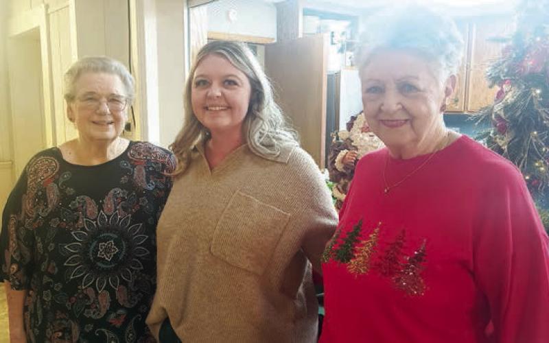 Hostesses, judge – Janet Kobza (left) and Patricia Greeson (right) were hostesses while Kylee Zapalac (center) judged the table decorating contest.