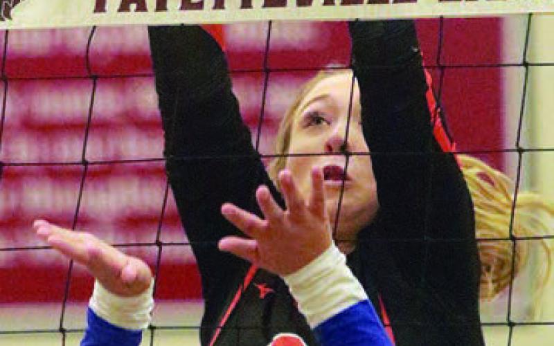 Reagan Dusek rejects a Snook tip in the first set. Sticker Photo By Darrell Vyvjala