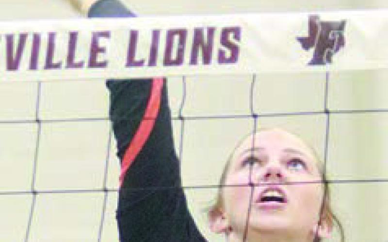 Clara Magliolo puts a swing on a third-set attack. Sticker Photo By Darrell Vyvjala