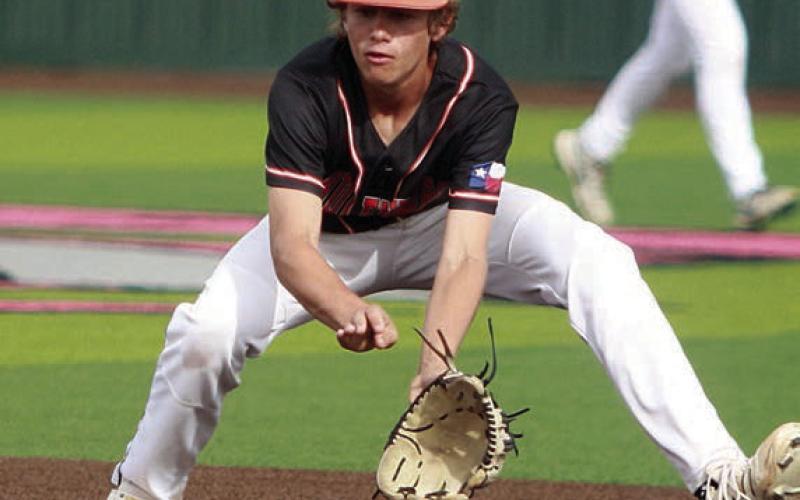 Second baseman Brayden Stoever looks in a grounder for an out in the bottom of the third inning. Sticker Photo By Darrell Vyvjala