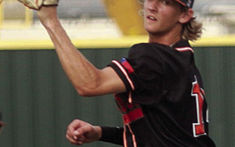 Pitcher Connor Lichnovsky fields a come-backer to end the bottom of the fourth inning. Sticker Photo By Darrell Vyvjala