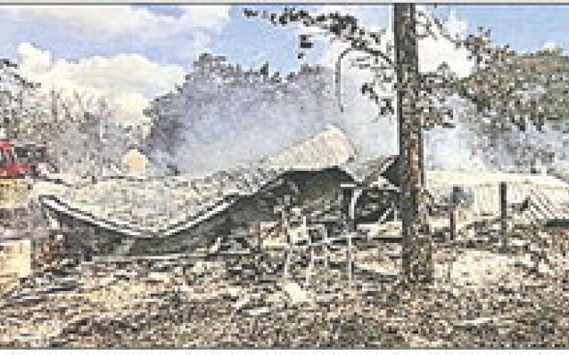 Structure burns north of La Grange