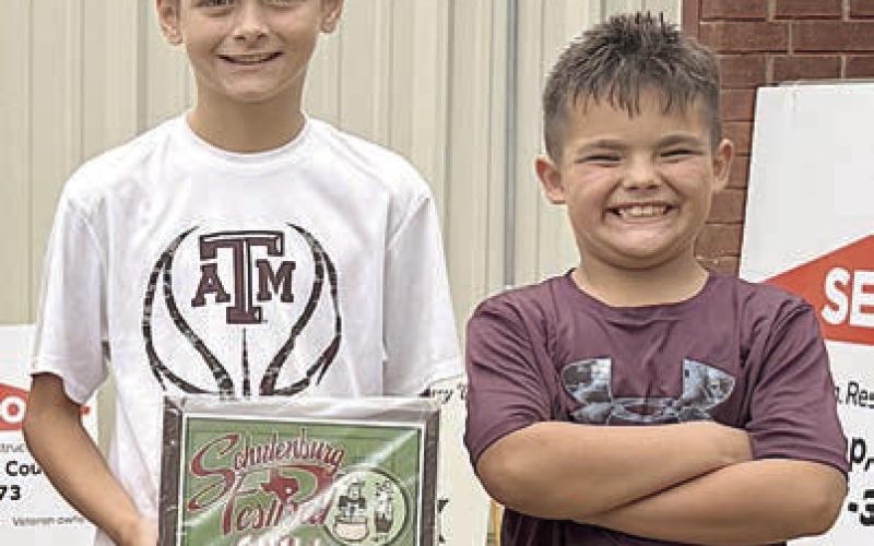 CASI chili showmanship 1st Place – “Tricky Pig” of Schulenburg, represented by (from left) Andrew Besetzny and Michael Cunningham. 2nd – Beer 30 Cookers of Schulenburg. 3rd – Cowgirls Kick Butt of Red Rock. Sticker Photo By Layne Vyvjala