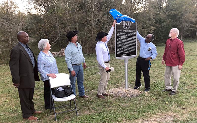 Connersville Primitive Baptist Church African American Cemetery had a Historical Marker dedicated on Monday, Nov. 15. Shown are (from left) Raymond Bryant, presiding elder of the Tenth Episcopal District Southwest Conference; Bobbie Nash, Fayette County Historical Commission chair; Luke Sternadel, Fayette County commissioner; Fayette County  Judge Joe Weber; and David Collins and Neale Rabensburg, historians and members of the Fayette County Historical Commission and the Round Top Area Historical Society.