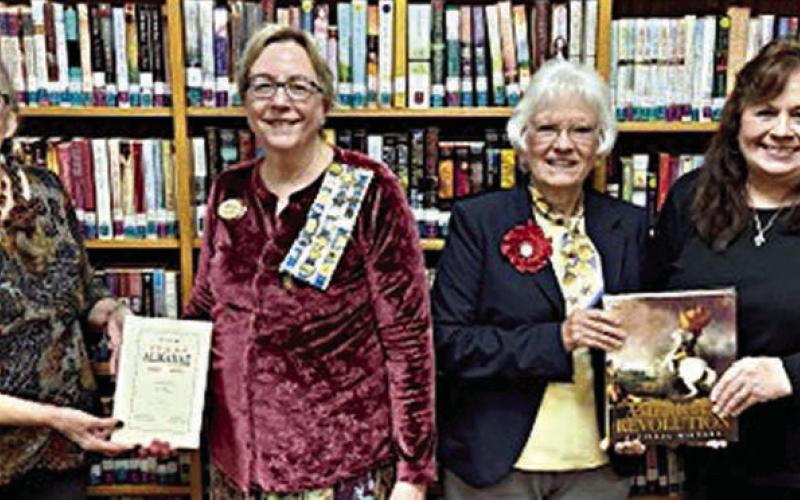 Presentation at Schulenburg Public Library – (from left) Cindy Lytle, Schulenburg Public Library staff; Kim Joost, Smith-McMillan Chapter librarian; Carolyn Caflisch, Smith-McMillan Chapter regent; and Donna Holub, Schulenburg Public Library staff.