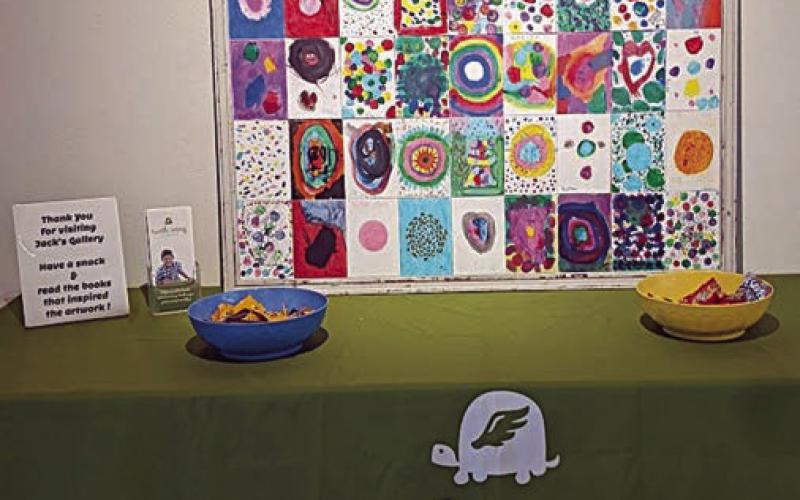 Turtle Wing Foundationcelebrated International Dot Day with  a focus on inspired inclusion. The “dot” artwork behind the table was  created by the Arts for Rural Texas art-after-school class in La Grange.