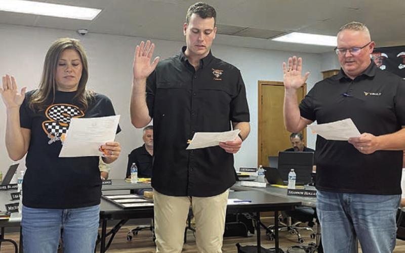 Taking the oath of office at last week’s meeting are newly-elected Schulenburg ISD Board of Trustees members (from left) Lisa Goodlander, incumbent Hale Hentges, and Dwayne Bartek. Their terms are for three years. Sticker Photo By Darrell Vyvjala
