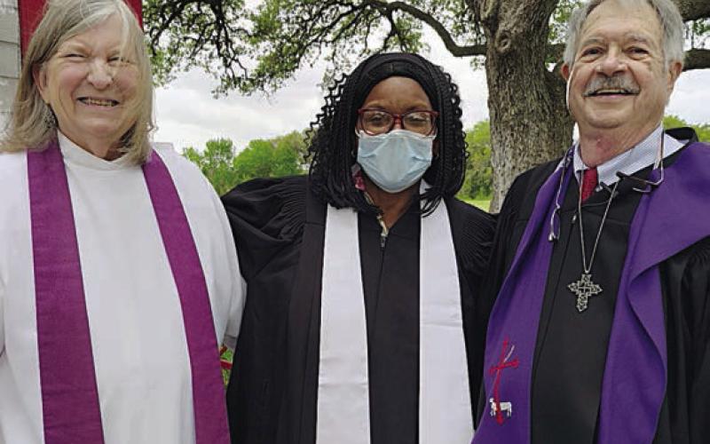From left – Rev. Lemae Higgs, host pastor, Rev. Dr. Pamela Sattiewhite, who gave the holy readings, and Rev. J.P. Kessie, who delivered the message at the Good Friday Community Service.