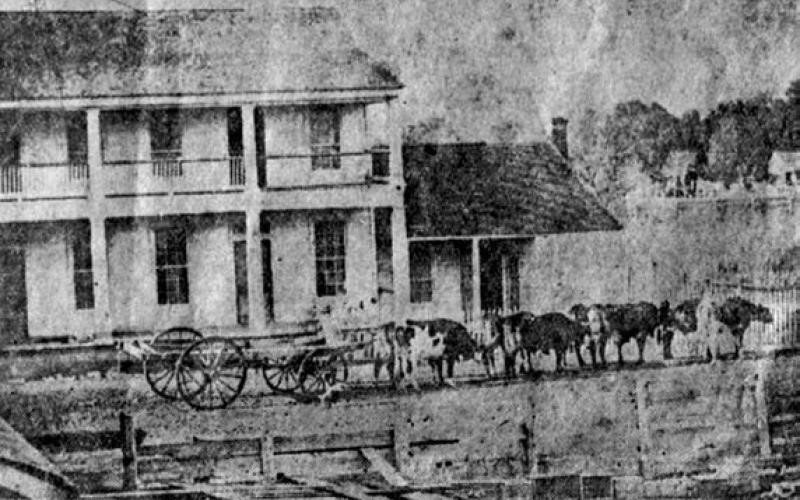 The hot el pictured behind th is team of oxen in the 1860s was located where the Lester Hotel later stood, in the northeast corner of the intersection of Colorado and Washington Streets in La Grange. Photo Courtesy of Fayette Heritage Museum &amp;amp; Archives