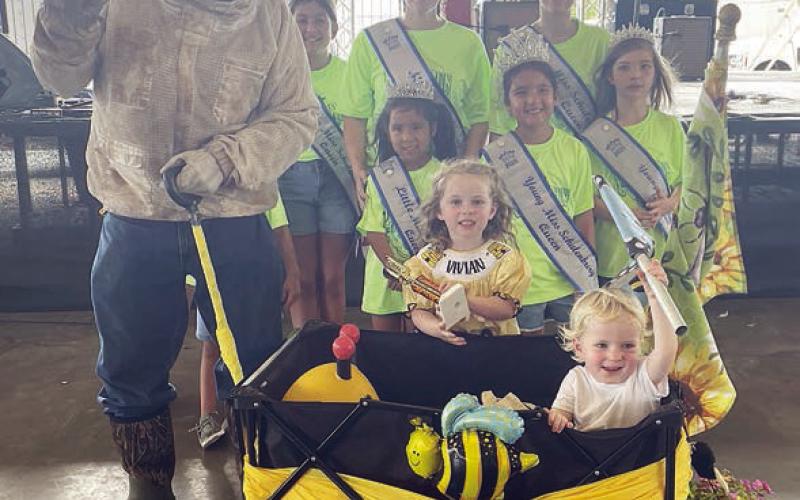 Second Place – “Bee Happy” Vivian and William Dennis with Tom Brents. Sticker Photo By Darrell Vyvjala