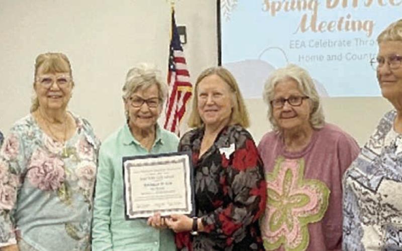 Accepting the 90th-year Club Award for Walhalla Extension Education Association Club were (from left) Sally Garrett, Fayette County Extension Agent-FCH; and Janice Alexander, Lila Garlin, Donna Burton and Helen Wagner, Walhalla Club EE members. Also shown is (right) Knellen Quinteros, District 11 EE director.