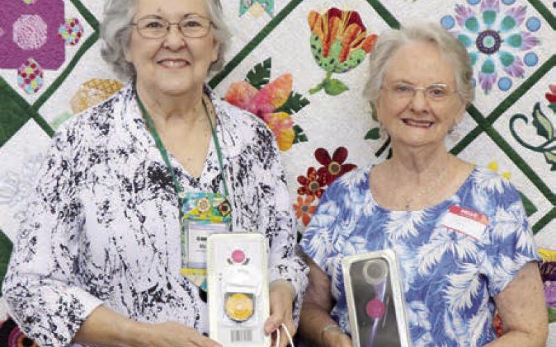 The Colorado Valley Quilt Guild’s “Cut Above” award went to Jo Anne Hill (left) and Pat Scherer (right).