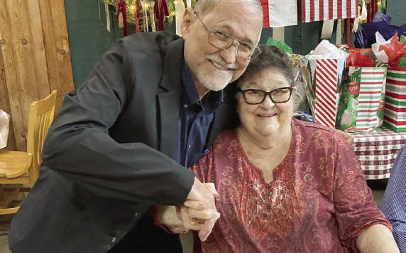 A 75-year membership pin was presented to Katherine Dittrich (right) by Hermann Sons Life Grand Lodge board member David Noak (left).