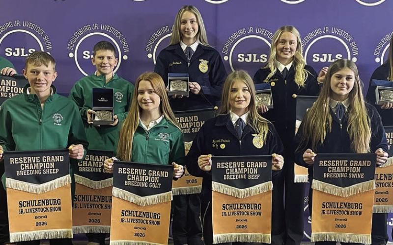 BREEDING SHOW – Front, from left: Holden Holub, reserve champ sheep; Kylee Hoffmann, reserve champ doe; Kyrroll Prihoda, reserve champ heifer; and Haylee Vacek, reserve champ swine. Back, from left: Abe McBride, grand champ swine; Hudson Holub, grand champ doe; Kimber Bartosch, grand champ sheep; Keeley Warnken, grand champ heifer; and Landry Zapalac, grand and reserve champ dairy. Sticker Photo By Darrell Vyvjala