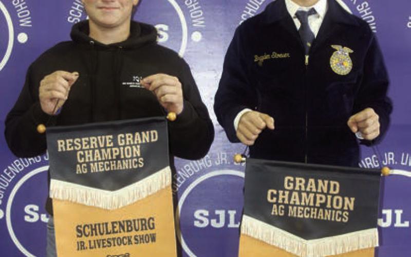 AG MECHANICS SHOW – From left: Cody Beiersdorfer, reserve champion (work table); and Brayden Stoever, grand champion (greenhouse). Sticker Photo By Darrell Vyvjala