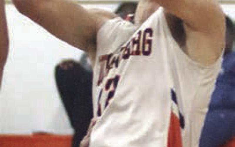 Van Prihoda elevates at the basket to score in the second quarter last Tuesday. Sticker Photo By Darrell Vyvjala
