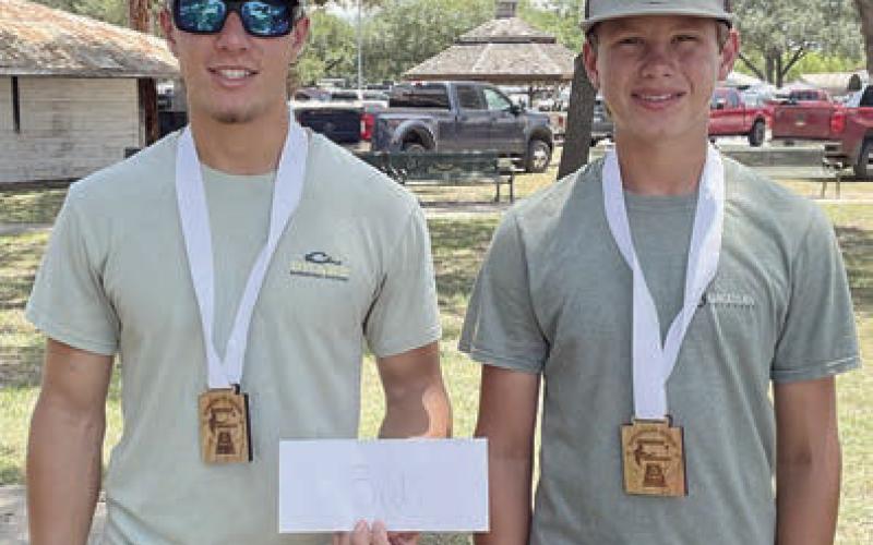 Third Place – “Stoever” - (from left) Bryce and Brayden Stoever. Sticker Photo By Darrell Vyvjala