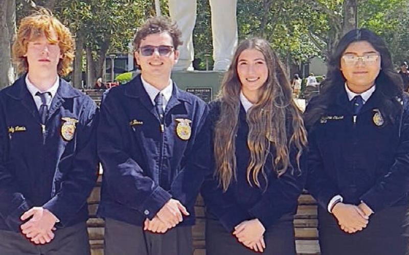 Farm Business Management Team – (from left) Cody Lewis, Scott Bass, Gracie Burton, and Shalanie Olvera. The team placed third in area and Lewis was fifth-place high point individual.